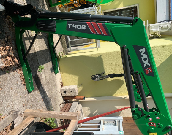 CARICATORE FRONTALE MX T408